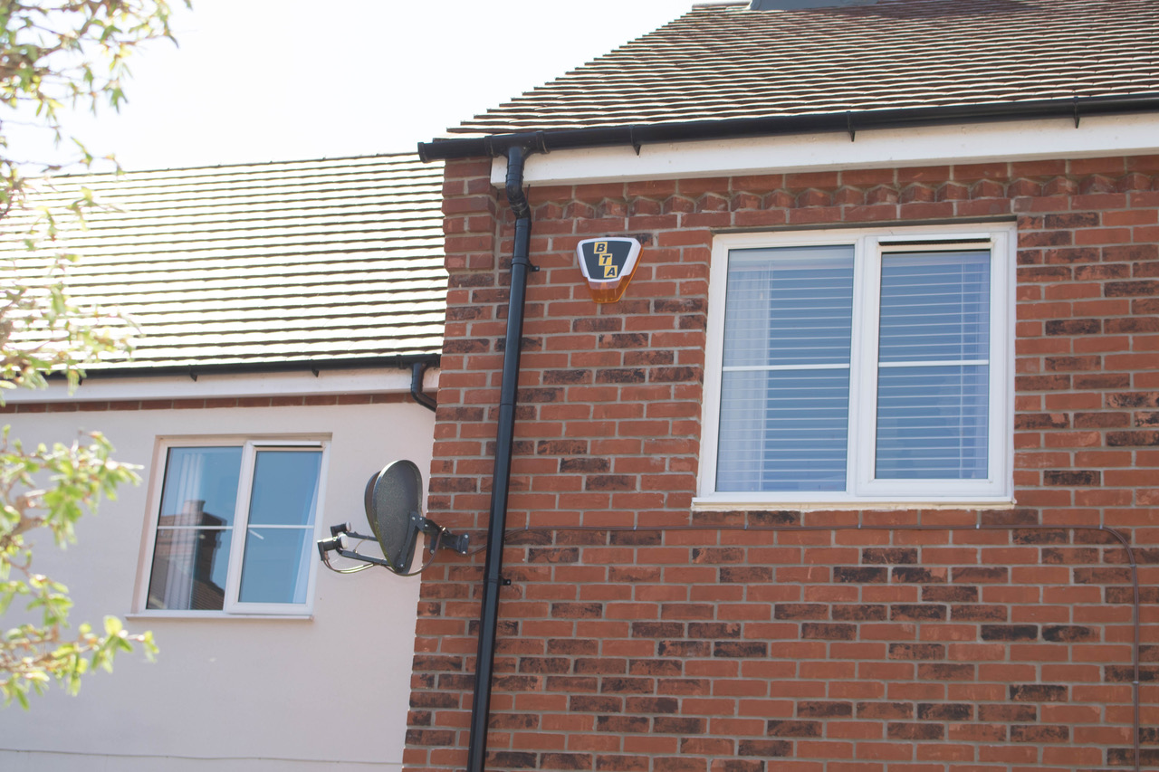 Bee Tee Alarms alarm fitted on the outside of a home to deter burglars